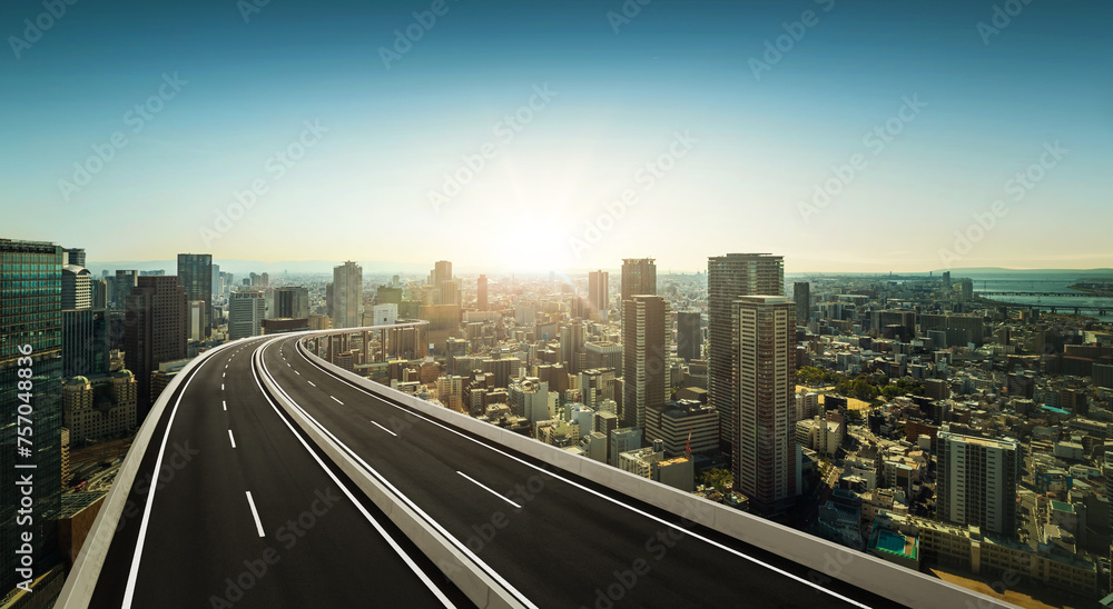 Panorama aerial view and Highway overpass with beautiful city background.