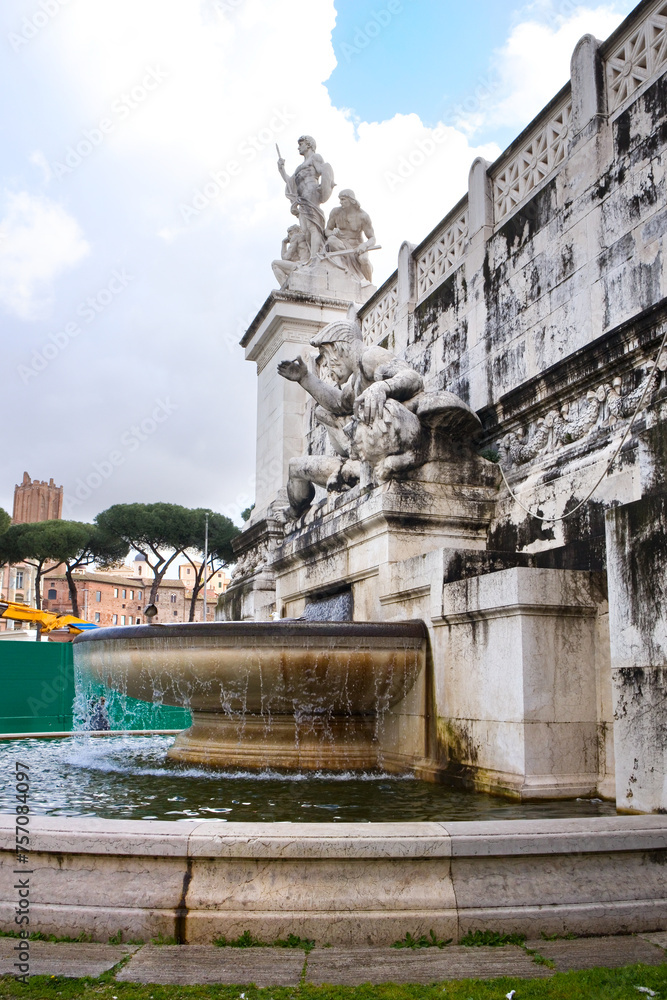 Adriatic fountain of National Monument the Vittoriano at Venezia square in Rome, Italy