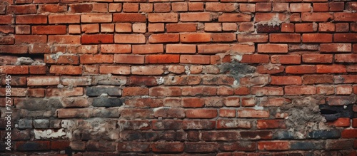 A detailed close up of a brown brick wall showcasing a multitude of rectangular bricks laid in a precise pattern with mortar in between