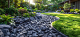 The design of beautiful Japanese rock garden with lawn and decorative plants