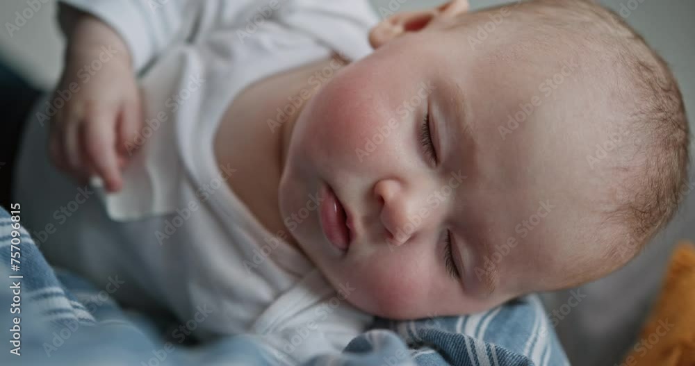 Father's Tender Kiss on His Baby Son's Cheek Close-Up Father's Tender Kiss on His Baby Son's Cheek Close-Up