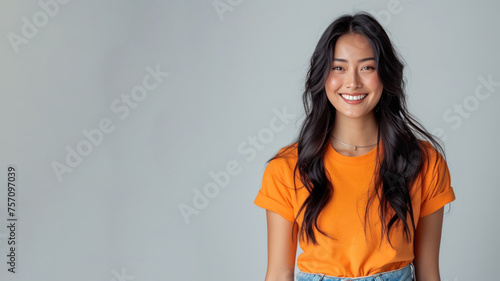 Malay woman wear orange casual t-shirt smile isolated