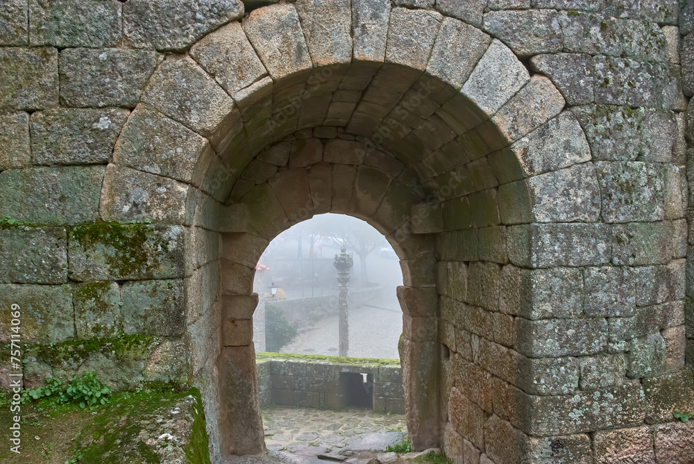 Gate of Betrayal and Manueline Pelourinho at Sortelha Castle in Portugal