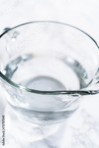 Measuring Glass Cups Filled with Water for Preparation