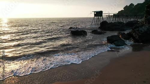 Fishing and seafood hut by the ocean in France, drone shot in 4K.