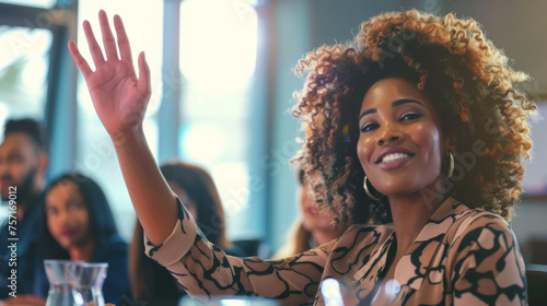 Portrait of a black afro american business woman rising hand to ask a question during a meeting , the powerful businesswoman is not afraid to take speak in public in front of her coworkers