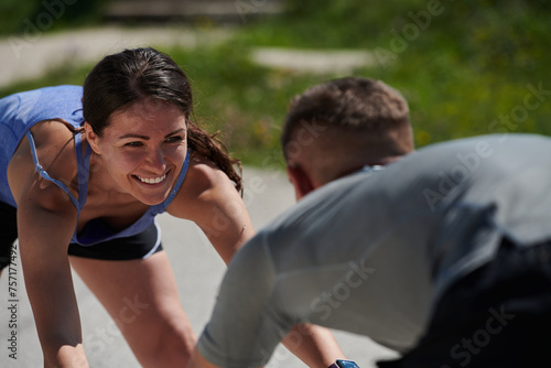 Exercise, mockup and couple workout and stretch together outdoors in nature by a mountain for health, wellness and fitness. People, partners and athletes training and keeping fit and heathy