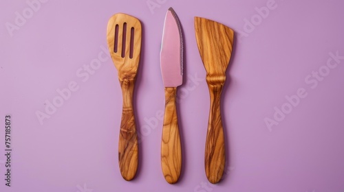 Two wooden utensils elegantly displayed side by side on a table