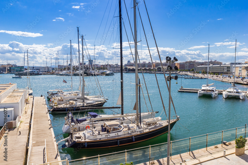 Sailing yachts at the jetty in the harbor of Valencia, Spain
