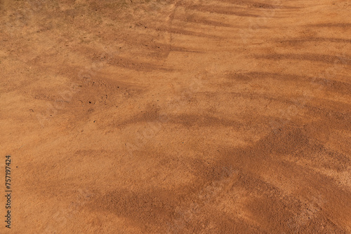 Quadro su tela a walking red path made of rammed sand after sweeping