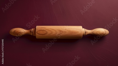 A wooden handle lies elegantly on a vibrant purple surface