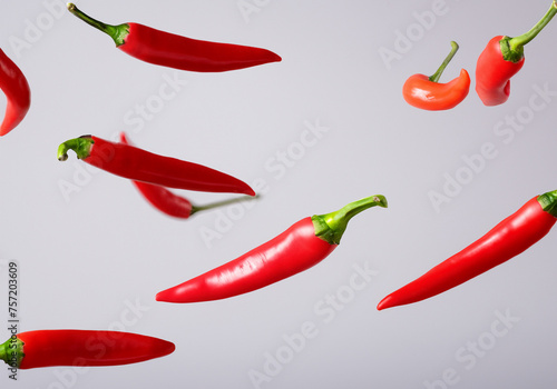 Fresh red chili in mid air