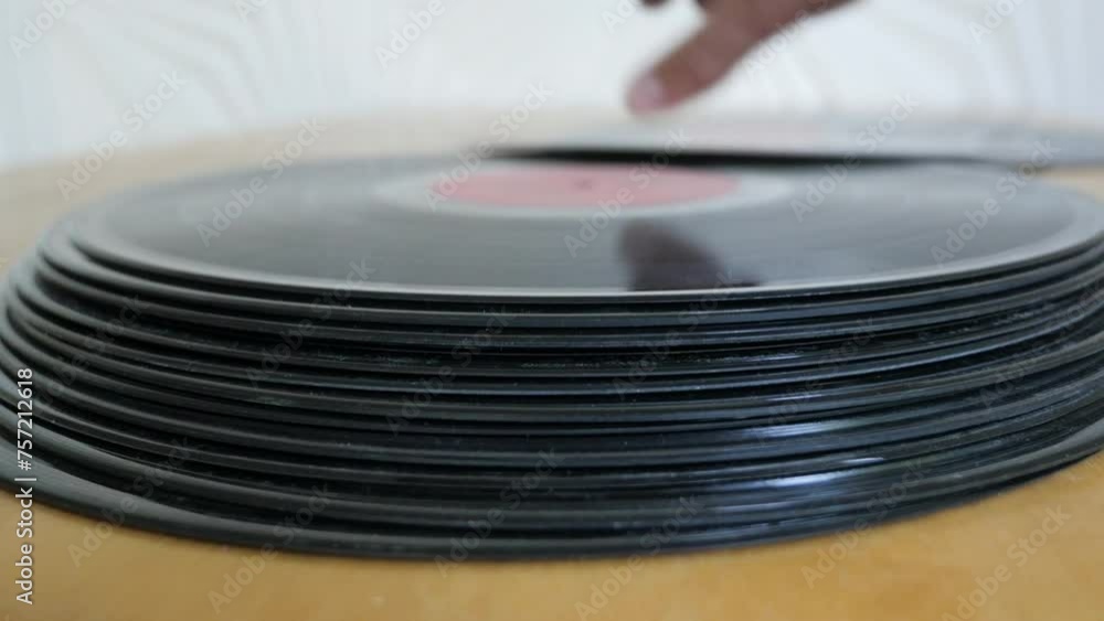 Close-Up Of Male Hands Choosing Vinyl Record
Close-Up Of Male Hands Choosing Vinyl Record