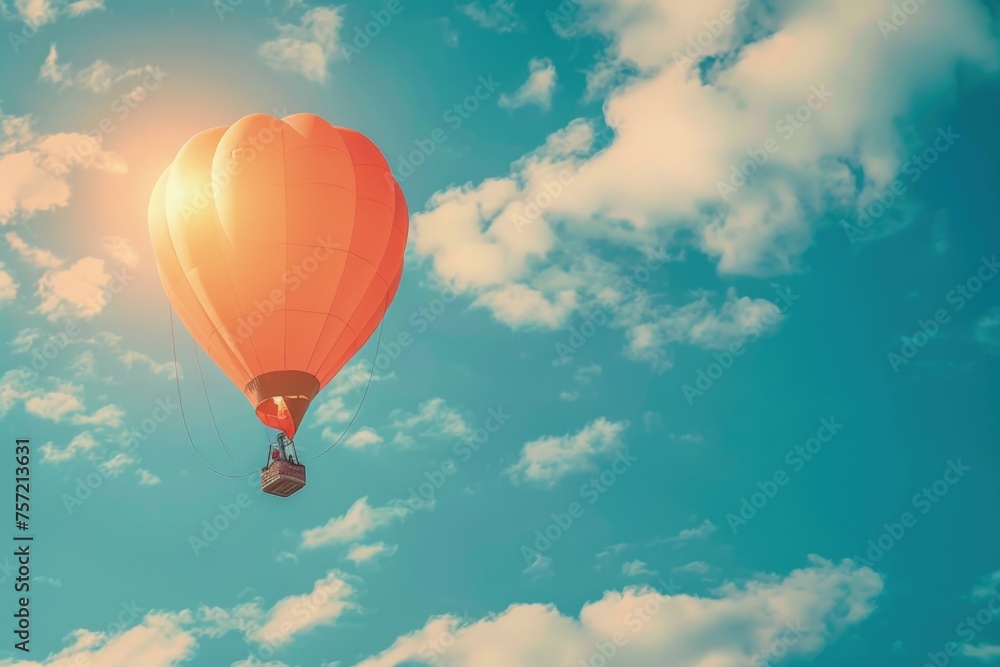 Fototapeta premium Hot air balloon flying in the sky with clouds, adventure, balloon ride.