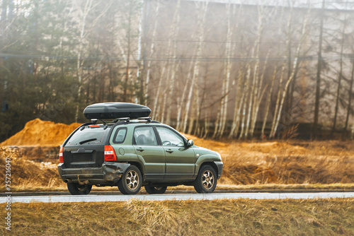 Exploring in Comfort. Family Car with Spacious Roof Rack Box