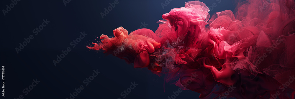 The vibrant dark red paint in the moment of graceful movement of a flowing cloud against a contrasting dark blue background. The vibrant dark red paint in the moment of graceful movement of a flowing cloud against a contrasting dark blue background.