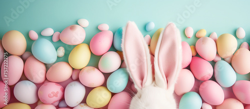 Bunny Ears Amidst Easter Eggs © liubovyashkir