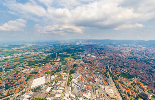 Turin, Italy. Panorama of the city in summer. Industrial and residential areas. Fields. Aerial view