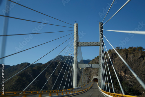 Puente Baluarte, el más alto del mundo, construcción atirantada de ingeniería moderna. De fondo la Sierra de Durango. Formaciones rocosas de la naturaleza, Orografía de Mexico. Semidesierto. photo
