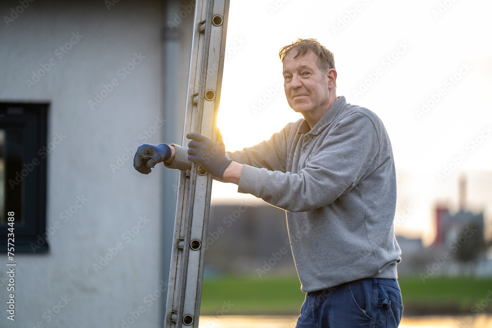 Man working outdoors at golden hour Man working outdoors at golden hour