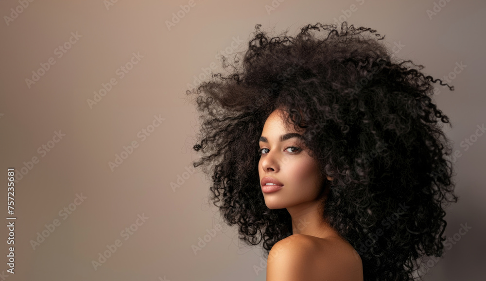 Gorgeous Woman with Beautiful and Volumous Curly Hair, Copy Space, Hair Care Advertising