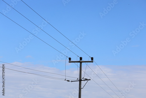 power lines on a clear sky