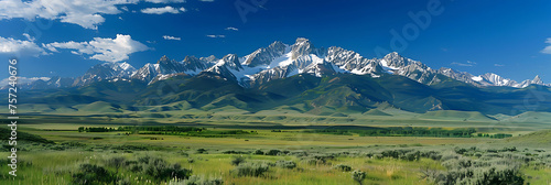 A serene mountain landscape, with snow-capped peaks towering over a peaceful alpine meadow