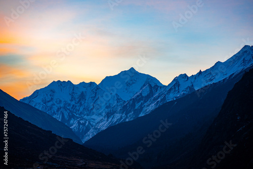 Alpenglow Splendor: Sunset Over the Snow-Capped Peaks of Langtang, Nepal