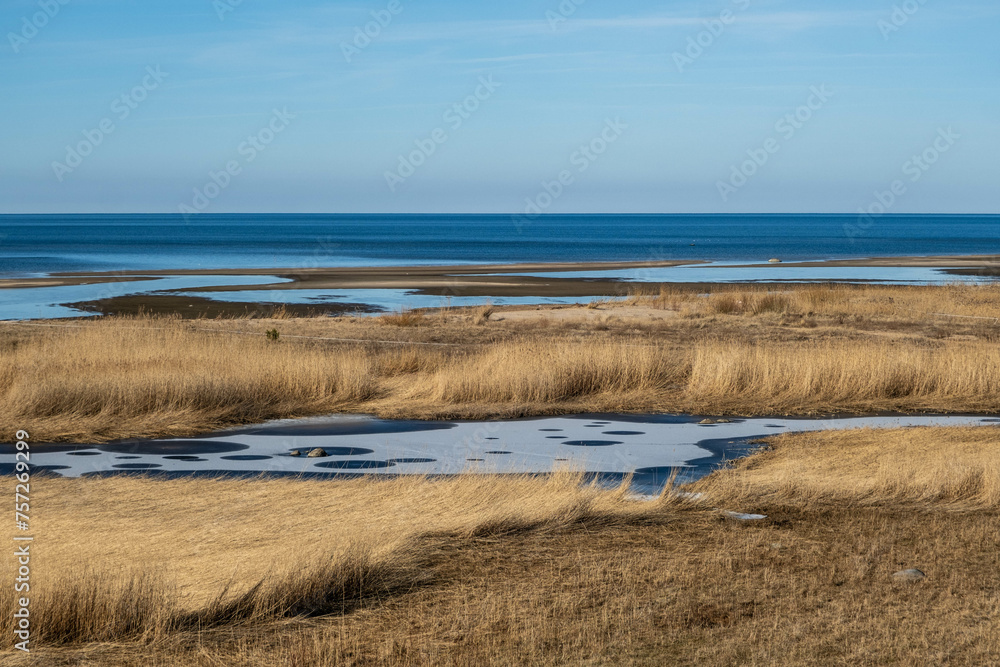 Tranquil Coastal Landscape Where Grasslands Meet the Sea. Tranquil Coastal Landscape Where Grasslands Meet the Sea.