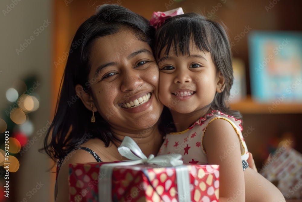 a wrapped gift present and its daughter a wrapped gift present and its daughter