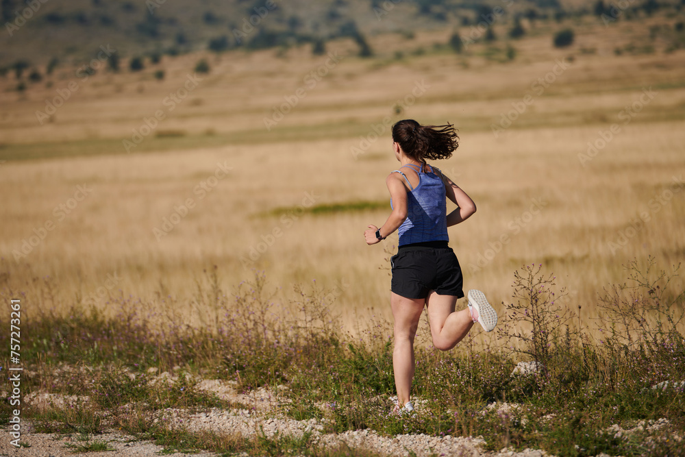 Solo Stride: Determined Athlete Woman Embarks on Fitness Journey for Marathon Preparation. Solo Stride: Determined Athlete Woman Embarks on Fitness Journey for Marathon Preparation.