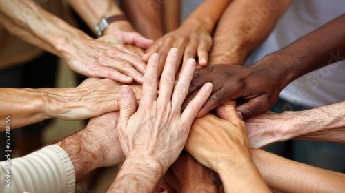 Diverse people joining their hands harmonious.