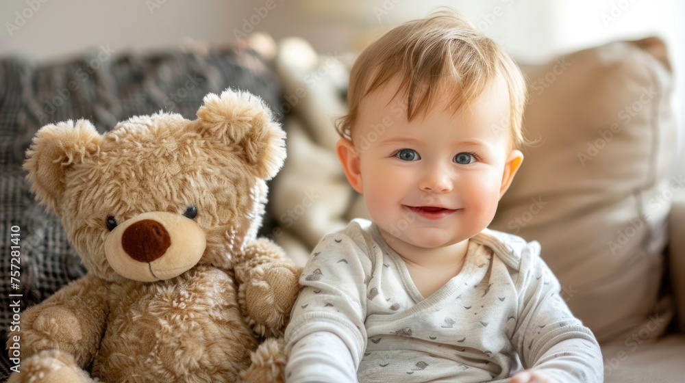 Happy cute toddler sitting with his teddy bear. Happy cute toddler sitting with his teddy bear.
