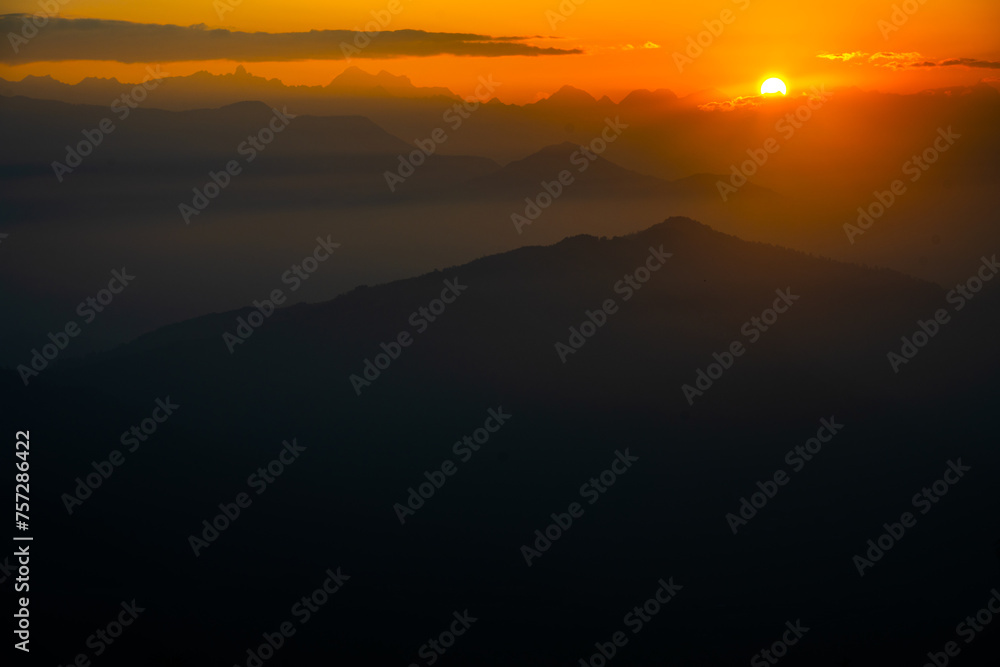 Sunrise Glow on the Horizon of Chisopani, Nepal Sunrise Glow on the Horizon of Chisopani, Nepal
