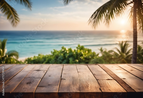Top of wood table with seascape and palm tree, blur bokeh light of calm sea and sky at tropical beach background