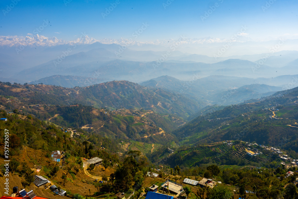 Hazy Morning Over Layered Mountain Ridges and Villages in Dhulikhel, Nepal