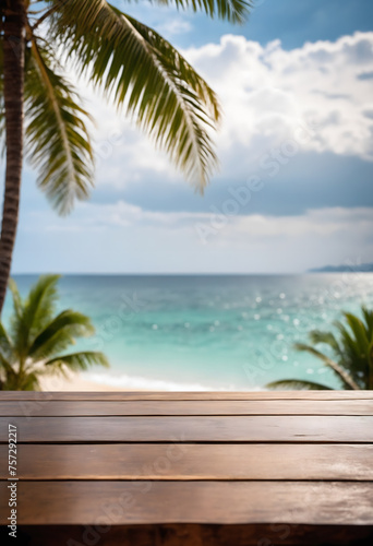 Top of wood table with seascape and palm tree  blur bokeh light of calm sea and sky at tropical beach background