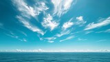 Tranquil Teal Skies: A Bright Summer Day with Fluffy Clouds and Clear Horizonม Nature's Beauty Teal Sky and Clear Blue Background in Spring