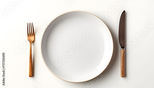 white plate with knife and fork isolated on white background