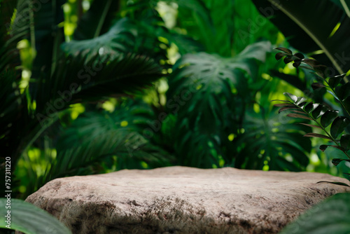 Stone table top in jungle forest with blur palm tree. Natural tropical scene for organic product placement podium background.