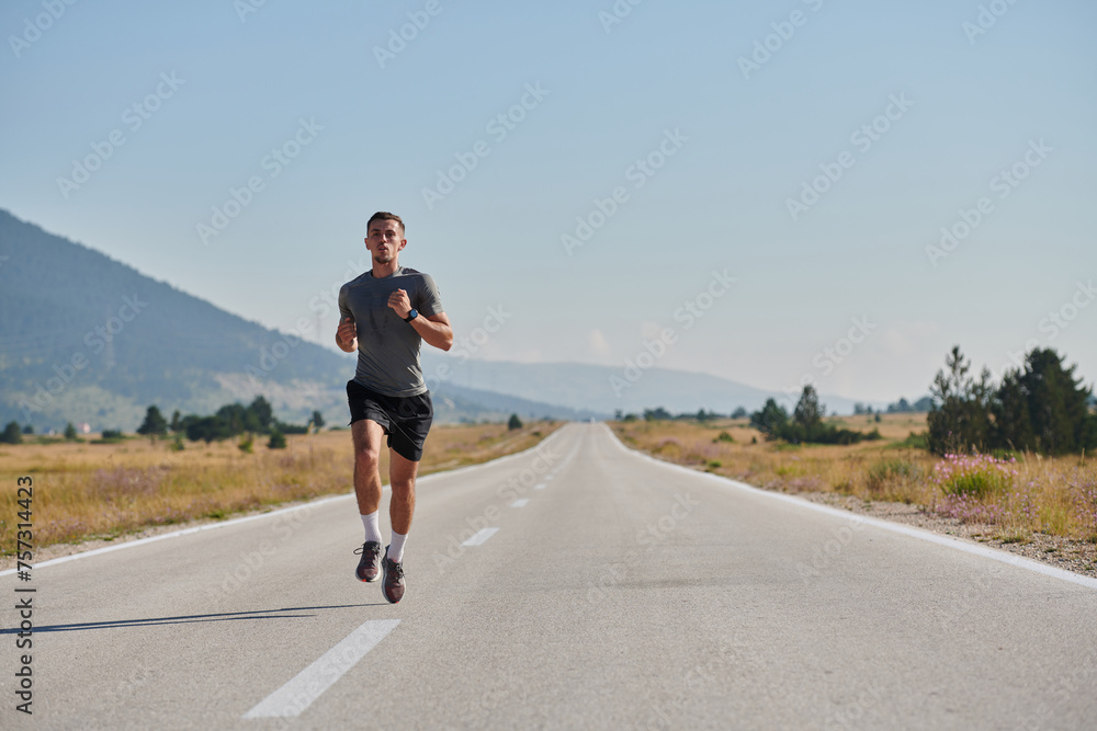 Fototapeta premium A dedicated marathon runner pushes himself to the limit in training.