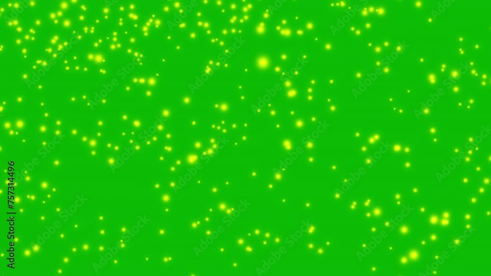 Mimosa color particles flowing in the wind on solid green background. Mimosa flowers abstract background. Mimosa color particles flowing in the wind on solid green background. Mimosa flowers abstract background.