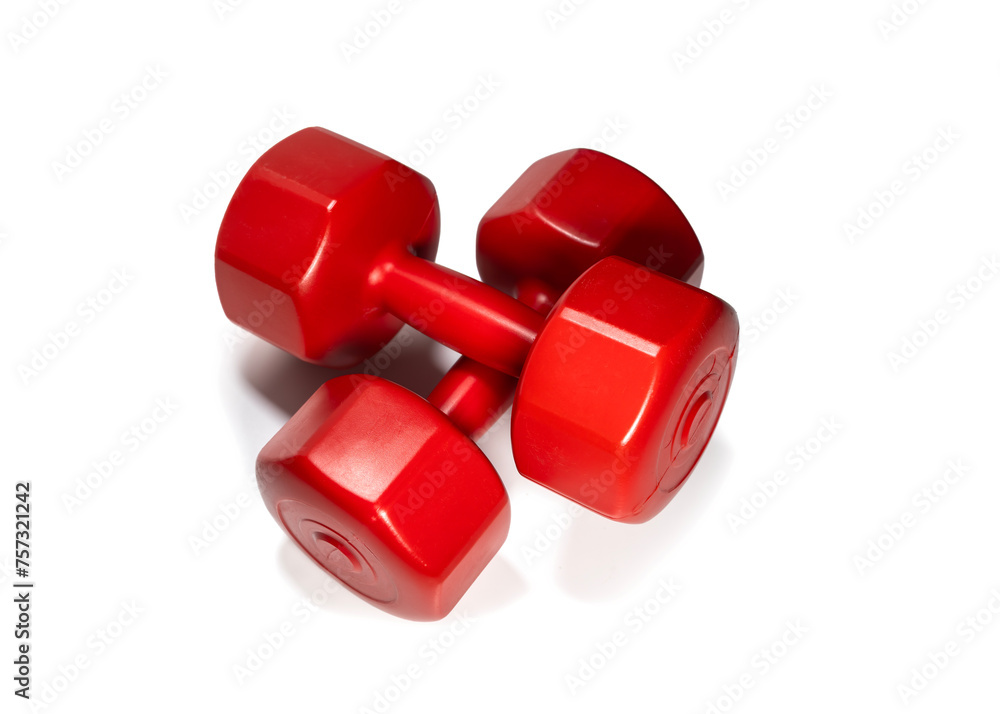 Red Plastic Dumbells Placed On Each Other, Isolated On White Background Red Plastic Dumbells Placed On Each Other, Isolated On White Background