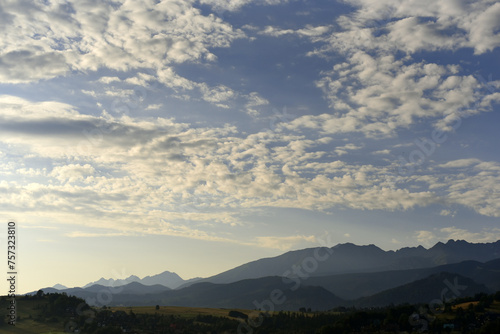 Mountain landscape against a blue sky. 
