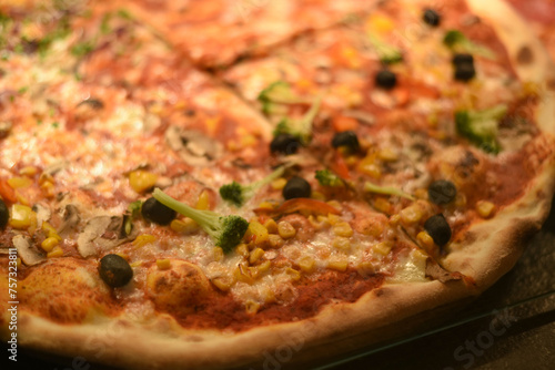 Fragrant and appetizing pizza with broccoli and olives