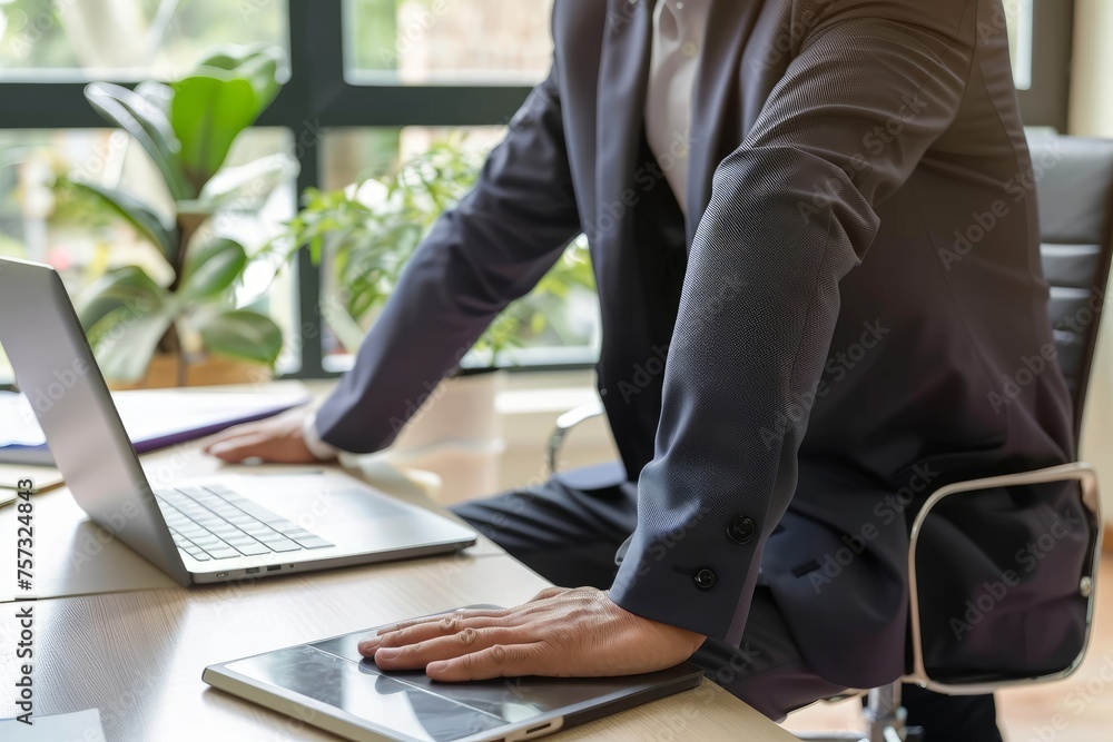 Back pain, businessman working long time sitting at laptop inside ...