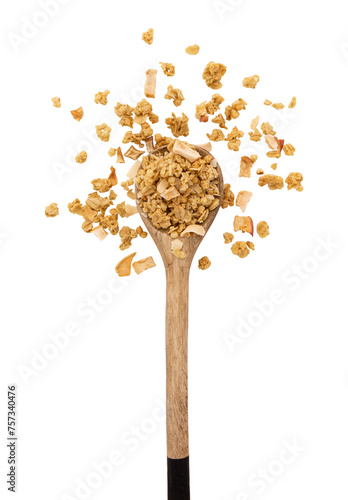 crunchy granola in wooden spoon isolated