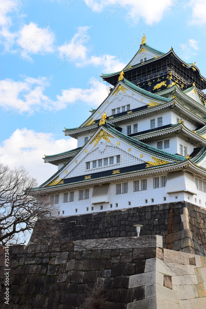 OSAKA, JAPAN - MARCH 13: Osaka Castle in Osaka, Japan on March 13, 2024. One of Japan's most famous and played a major role in the unification of Japan during the 16th century