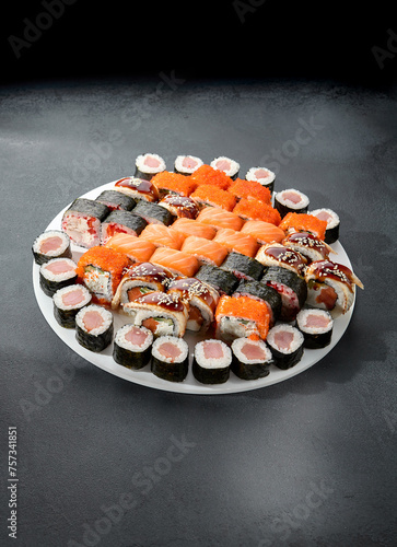 Assorted sushi and maki rolls platter with tuna, salmon, and eel, perfect for a Japanese cuisine experience
