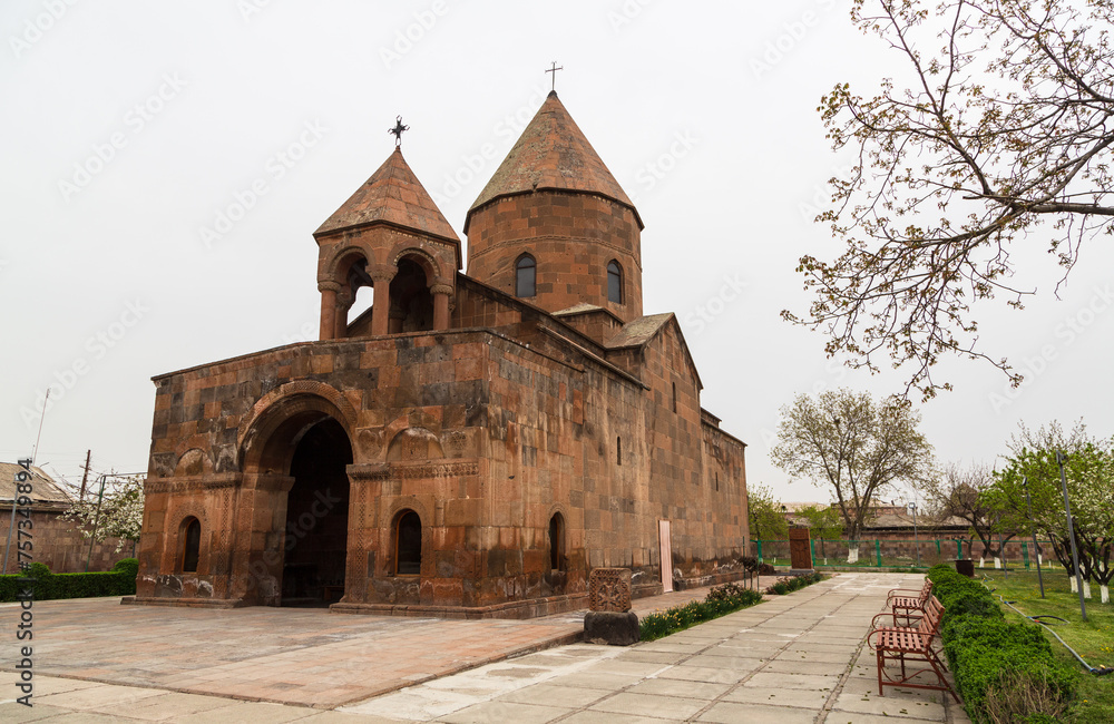 Exterior of old Shoghakat church in Vagharshapat (Etchmiadzin), Armenia. It is built with red and black tufa stones, erected on the remains of a 6th-century basilica